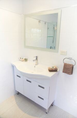 Imagen de la habitación del Hotel Poinciana Cottages. Foto 24