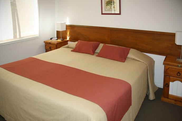 Imagen de la habitación del Hotel Poinciana Cottages. Foto 25