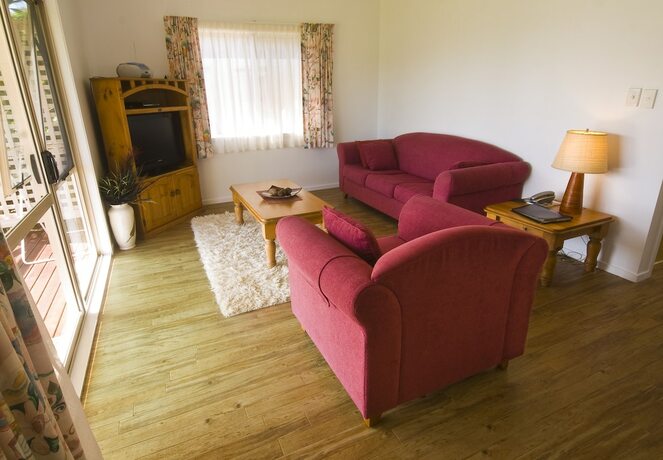 Imagen de la habitación del Hotel Poinciana Cottages. Foto 26