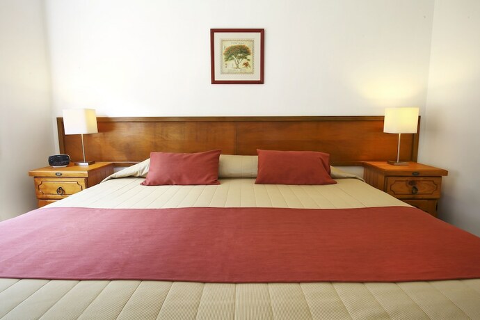 Imagen de la habitación del Hotel Poinciana Cottages. Foto 27