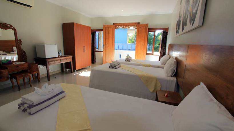 Imagen de la habitación del Hotel Poinciana Resort Bali. Foto 3