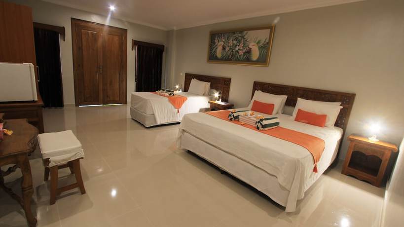 Imagen de la habitación del Hotel Poinciana Resort Bali. Foto 5