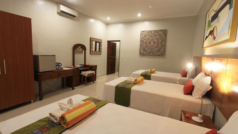 Imagen de la habitación del Hotel Poinciana Resort Bali. Foto 6