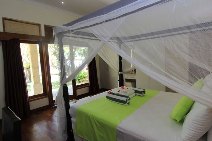 Imagen de la habitación del Hotel Poinciana Resort Bali. Foto 7