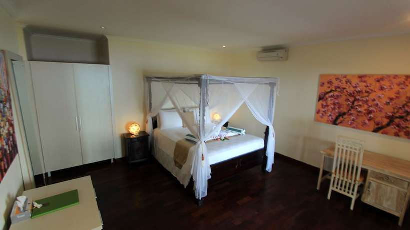 Imagen de la habitación del Hotel Poinciana Resort Bali. Foto 9