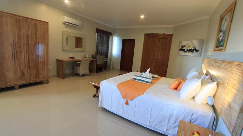Imagen de la habitación del Hotel Poinciana Resort Bali. Foto 10