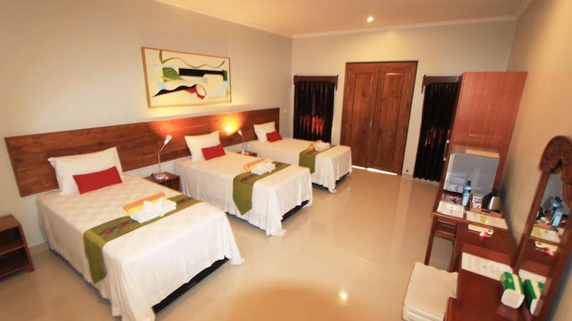 Imagen de la habitación del Hotel Poinciana Resort Bali. Foto 15
