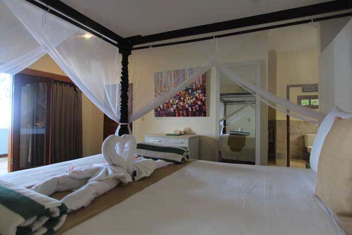 Imagen de la habitación del Hotel Poinciana Resort Bali. Foto 16