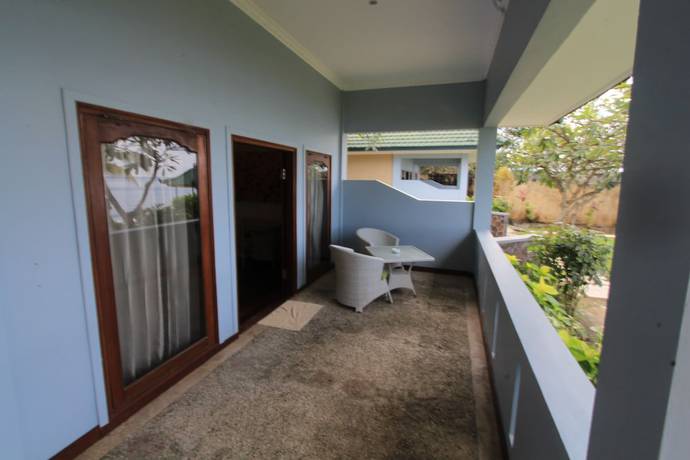 Imagen de la habitación del Hotel Poinciana Resort Bali. Foto 19