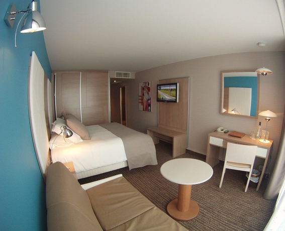 Imagen de la habitación del Hotel Point France. Foto 1