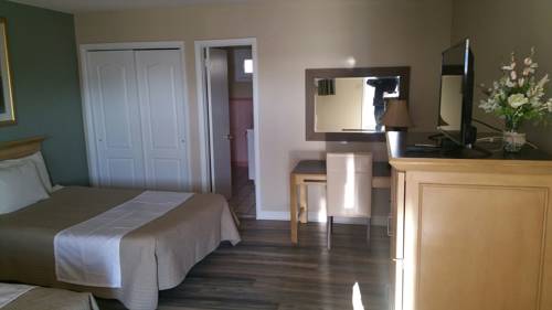 Imagen de la habitación del Hotel Point Pleasant Manor. Foto 6