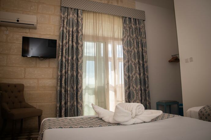 Imagen de la habitación del Hotel Point de Vue. Foto 16