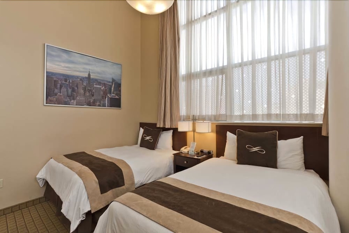 Imagen de la habitación del Hotel Pointe Plaza. Foto 13