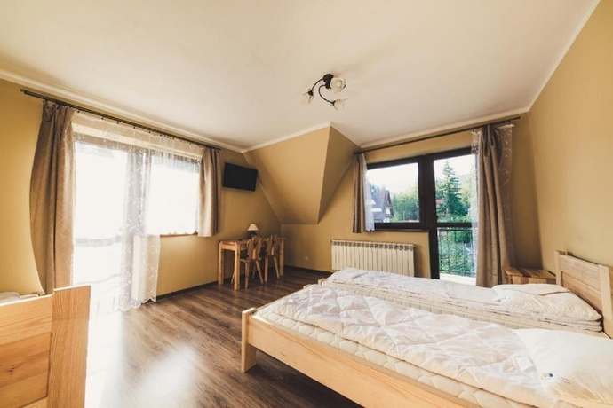 Imagen de la habitación del Hotel Pokoje i Apartamenty Nad Potokiem. Foto 2