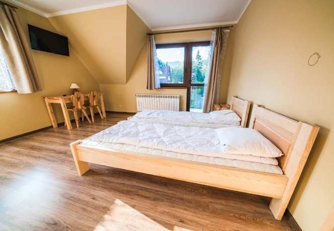 Imagen de la habitación del Hotel Pokoje i Apartamenty Nad Potokiem. Foto 3