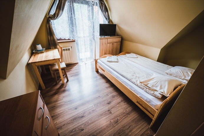 Imagen de la habitación del Hotel Pokoje i Apartamenty Nad Potokiem. Foto 4