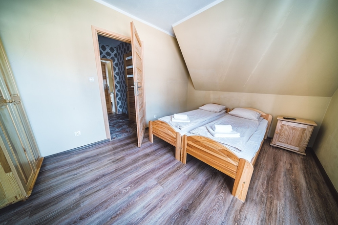 Imagen de la habitación del Hotel Pokoje i Apartamenty Nad Potokiem. Foto 9
