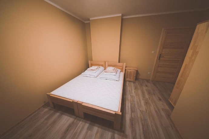 Imagen de la habitación del Hotel Pokoje i Apartamenty Nad Potokiem. Foto 12