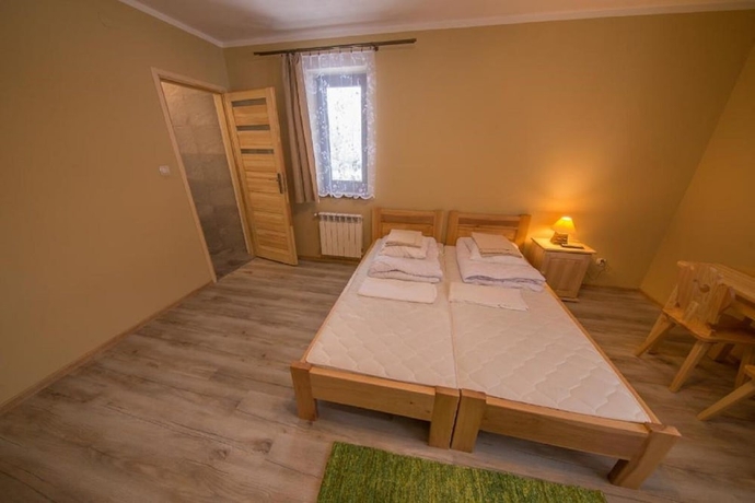 Imagen de la habitación del Hotel Pokoje i Apartamenty Nad Potokiem. Foto 13