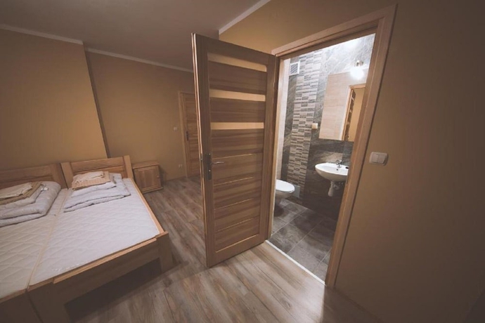 Imagen de la habitación del Hotel Pokoje i Apartamenty Nad Potokiem. Foto 16