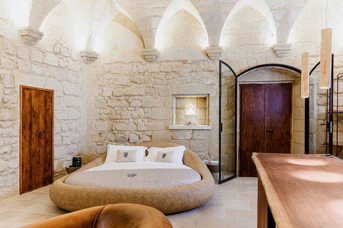 Imagen de la habitación del Hotel Pollicastro Boutique. Foto 15