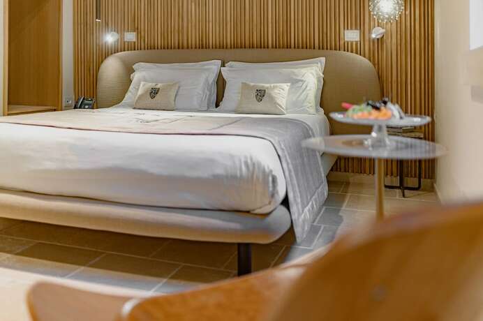 Imagen de la habitación del Hotel Pollicastro Boutique. Foto 18