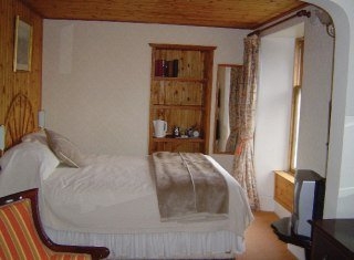 Imagen de la habitación del Hotel Polmaily House. Foto 5
