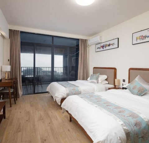 Imagen de la habitación del Hotel Poltton International Apartment Jinding. Foto 5