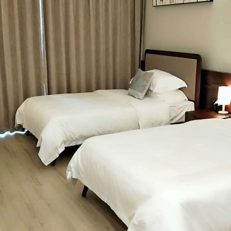 Imagen de la habitación del Hotel Poltton International Apartment Jinding. Foto 7