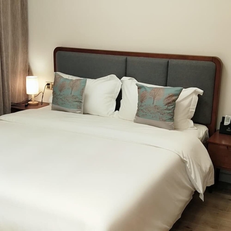 Imagen de la habitación del Hotel Poltton International Apartment Jinding. Foto 10