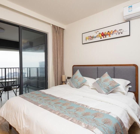 Imagen de la habitación del Hotel Poltton International Apartment Jinding. Foto 14