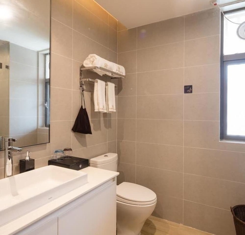 Imagen de la habitación del Hotel Poltton International Apartment Jinding. Foto 15