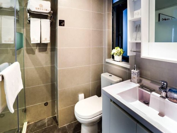 Imagen de la habitación del Hotel Poltton International Apartment Jinding. Foto 17