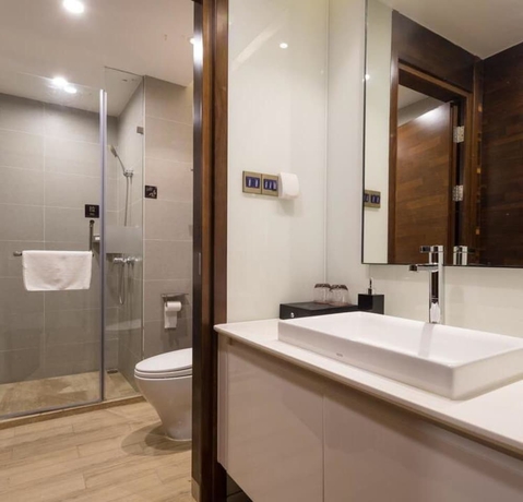 Imagen de la habitación del Hotel Poltton International Apartment Jinding. Foto 18