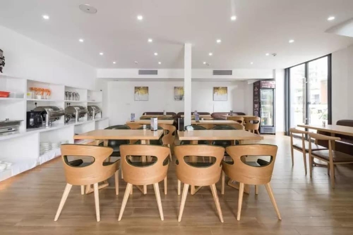 Imagen del bar/restaurante del Hotel Poltton International Apartment Jinding. Foto 3