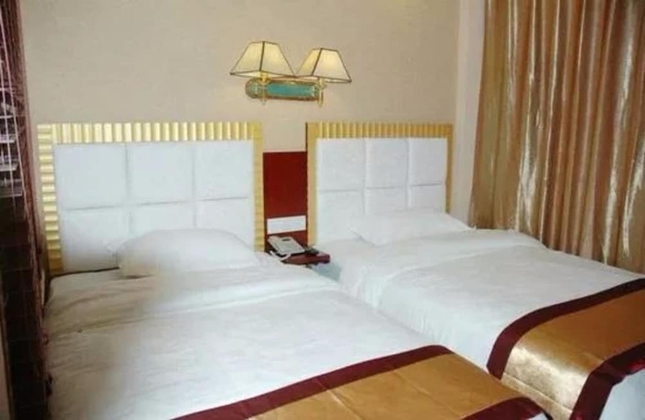 Imagen de la habitación del Hotel Poltton International Apartment Kunming Railway Station. Foto 6