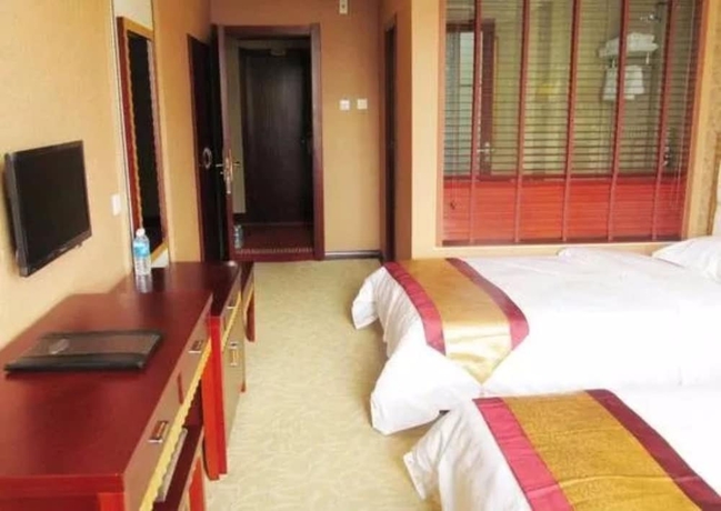 Imagen de la habitación del Hotel Poltton International Apartment Kunming Railway Station. Foto 7