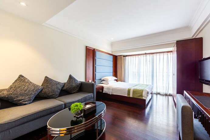 Imagen de la habitación del Hotel Poltton International Apartment Pazhou. Foto 18