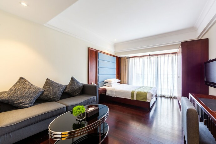 Imagen de la habitación del Hotel Poltton International Apartment Pazhou. Foto 19