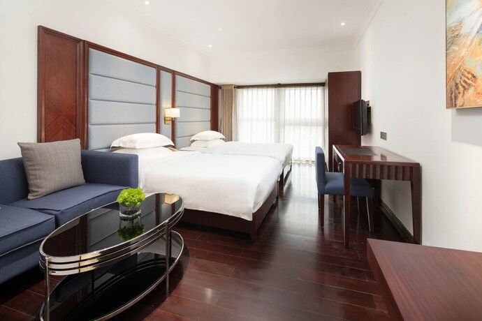 Imagen de la habitación del Hotel Poltton International Apartment Pazhou. Foto 24