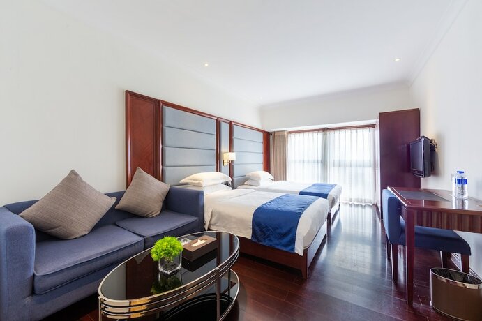 Imagen de la habitación del Hotel Poltton International Apartment Pazhou. Foto 25