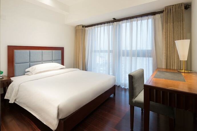 Imagen de la habitación del Hotel Poltton International Apartment Pazhou. Foto 28