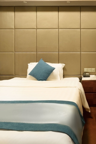 Imagen de la habitación del Hotel Poltton International Apartment (foshan Zumiao Lingnan Tiandi Branch). Foto 14