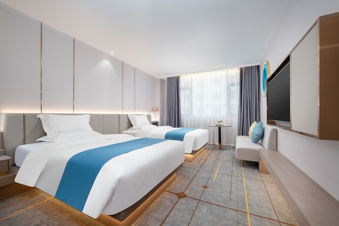 Imagen de la habitación del Hotel Poltton International. Foto 4