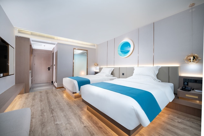 Imagen de la habitación del Hotel Poltton International. Foto 6
