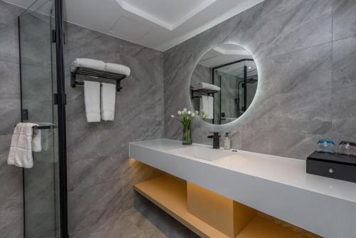 Imagen de la habitación del Hotel Poltton International Guangzhou Panyu Nancun Branch. Foto 8
