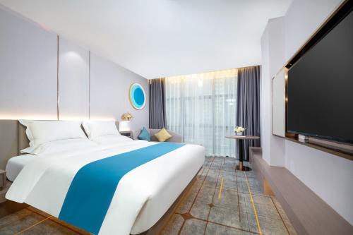 Imagen de la habitación del Hotel Poltton International - Huizhou University of economics. Foto 15