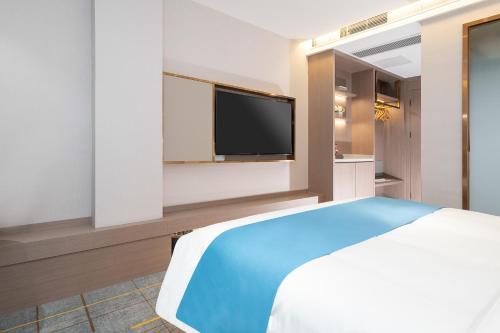 Imagen de la habitación del Hotel Poltton International - Huizhou University of economics. Foto 17