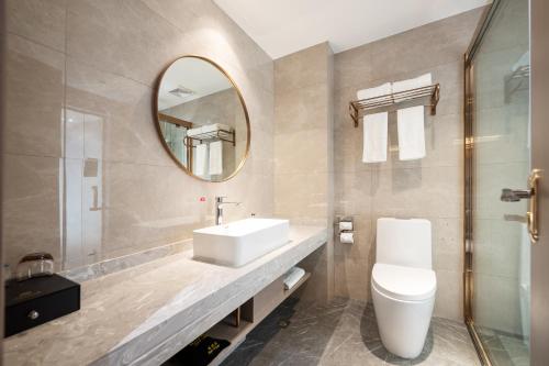 Imagen de la habitación del Hotel Poltton International - Huizhou University of economics. Foto 18