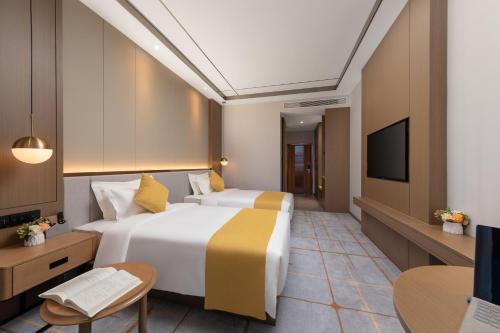 Imagen general del Hotel Poltton International Service Apartments - Zhuhai Gongbei Port Fuhuali. Foto 2